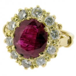 Oval Ruby and Brilliant Cut Diamond cluster Ring