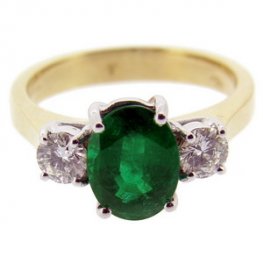 A Stunning Oval Emerald and Diamond Ring