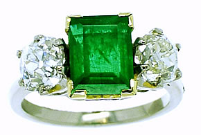 An Emerald Ring. An Emerald & Old Cut Diamond Three Stone Ring - Click Image to Close