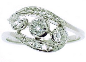 Brilliant Cut Diamond Three Stone Ring. Cross over design - Click Image to Close
