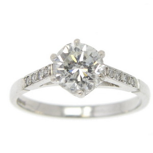 A Brilliant Cut diamond engagement ring, diamond set shoulders - Click Image to Close