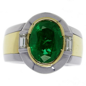 A Contemporary Oval Emerald and Diamond single stone ring - Click Image to Close