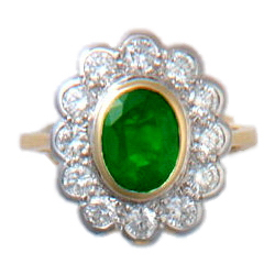 An Oval Emerald & Diamond Ring - Click Image to Close