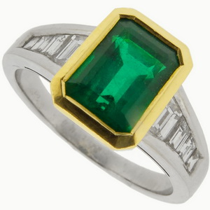 An Emerald cut Emerald Solitaire Ring with Diamond Set shoulders - Click Image to Close