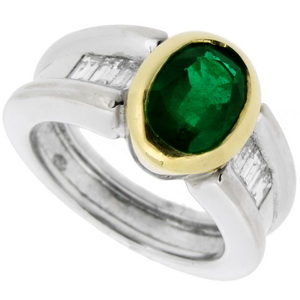 An Emerald Solitaire ring designed as an oval - Click Image to Close