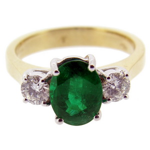A Stunning Oval Emerald and Diamond Ring - Click Image to Close