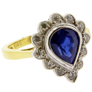 An 18ct Gold Pear Shape Sapphire and Diamond Cluster Ring - Click Image to Close