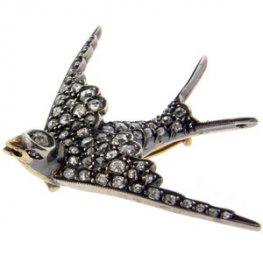 Antique diamond set swallow brooch