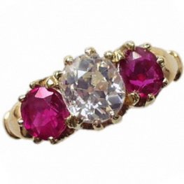 A Victorian Ruby and Old Cut Diamond Three Stone Ring