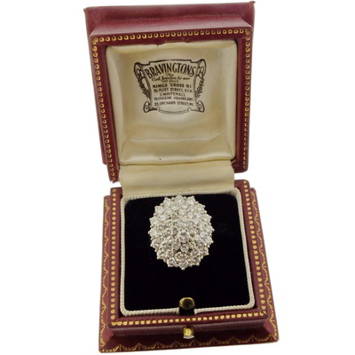 An Enchanting Diamond Cluster Dress Ring. Circa 1970.