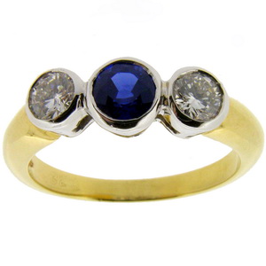 A Sapphire and Diamond Three Stone Ring - Click Image to Close